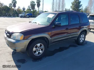 2001 Mazda Tribute LX with VIN 4F2YU08131KM39817, listed as a IAAI auction lot 41678877 with 210,715 mi miles. Bid and sale history available at carsss.com. Image 2.
