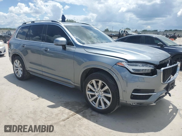 2017 Volvo XC90 Momentum with VIN YV4A22PK8H1173169, listed as a Copart auction lot 56561005 with 105,622 mi miles and Salvage Title. Bid and sale history available at DreamBid. Image 4.