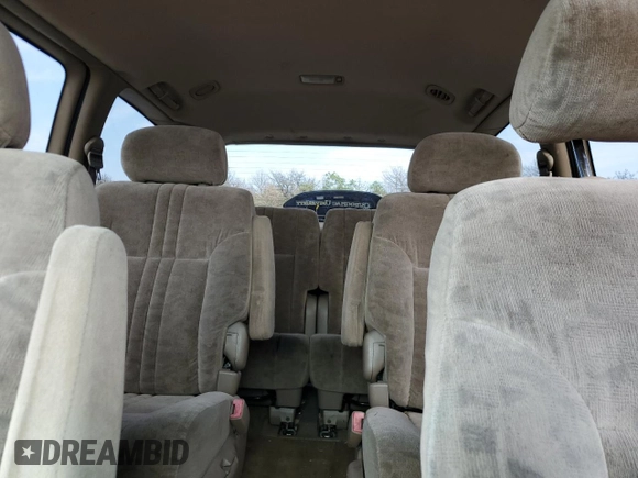 2002 Toyota Sienna LE with VIN 4T3ZF13C52U496378, listed as a Copart auction lot 64491614 with 176,441 mi miles and Clean Title. Bid and sale history available at carsss.com. Image 10.