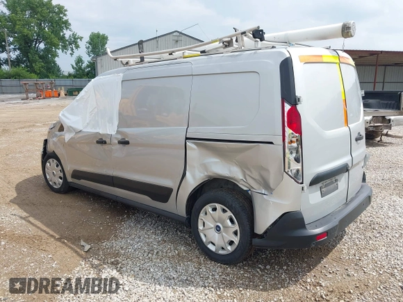 2021 Ford Transit Connect XLT z VIN NM0LS7F29M1503029, wystawiony jako IAAI lot #42556379 z przebiegiem 80 738 mil mil oraz . Historia ofert i sprzedaży dostępna na DreamBid. Obrazek 3.