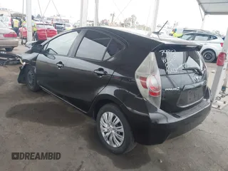2012 Toyota Prius One with VIN JTDKDTB39C1021255, listed as a IAAI auction lot 42044059 with 190,989 mi miles. Bid and sale history available at carsss.com. Image 3.