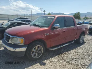 2001 Ford F-150 XLT with VIN 1FTRW07W71KE22482, listed as a Copart auction lot 62546815 with 218,501 mi miles and Clean title. Bid and sale history available at DreamBid. Image 1.
