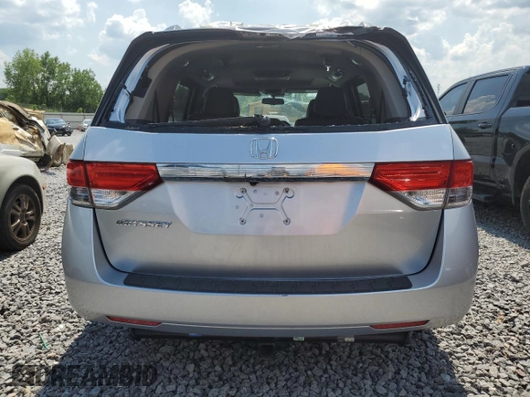 2014 Honda Odyssey EX-L with VIN 5FNRL5H63EB042207, listed as a Copart auction lot 61957605 with 204,563 mi miles and Salvage title. Bid and sale history available at DreamBid. Image 6.