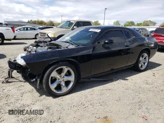 2012 Dodge Challenger SXT Plus with VIN 2C3CDYAG8CH173961, listed as a Copart auction lot 50959275 with 136,639 mi miles and Salvage Title. Bid and sale history available at carsss.com. Image 1.