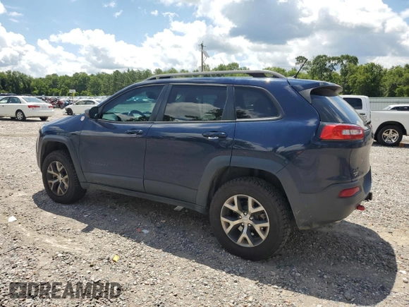 2014 Jeep Cherokee Trailhawk with VIN 1C4PJMBS7EW170345, listed as a Copart auction lot 60565765 with 98,382 mi miles and Salvage title. Bid and sale history available at DreamBid. Image 2.