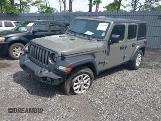 2023 Jeep Wrangler Willys с VIN 1C4HJXDG3PW619148, выставлен на аукционе IAAI как лот 42321982 с пробегом 24 277 миль миль и . История ставок и продаж доступна на DreamBid. Изображение 2.