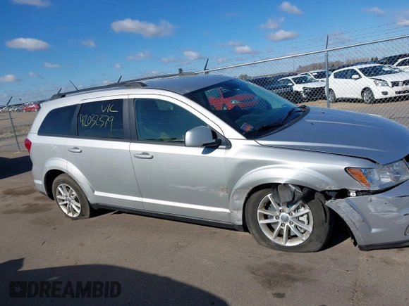 2013 Dodge Journey SXT with VIN 3C4PDDBG4DT506900, listed as a IAAI auction lot 42032379 with 130,911 mi miles and . Bid and sale history available at DreamBid. Image 13.