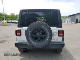 2021 Jeep Wrangler Unlimited Willys z VIN 1C4HJXDN3MW731183, wystawiony jako Copart lot #56769575 z przebiegiem 34 624 mil mil oraz Szkoda całkowita • Salvage title. Historia ofert i sprzedaży dostępna na DreamBid. Obrazek 6.