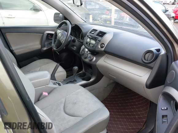 2009 Toyota RAV4 with VIN JTMZF33V995001985, listed as a IAAI auction lot 41932410 with 113,713 mi miles. Bid and sale history available at carsss.com. Image 5.