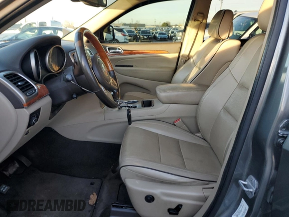 2011 Jeep Grand Cherokee Overland with VIN 1J4RS6GGXBC601757, listed as a Copart auction lot 82770454 with 132,109 mi miles and Salvage Title. Bid and sale history available at DreamBid. Image 7.