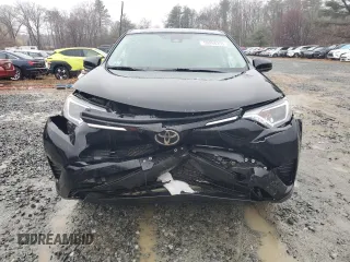2018 Toyota RAV4 LE with VIN 2T3BFREV5JW754945, listed as a Copart auction lot 50298355 with 67,991 mi miles and Salvage Title. Bid and sale history available at DreamBid. Image 5.