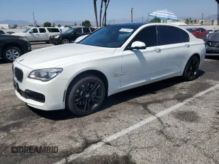 2013 BMW 7 Series 750Li with VIN WBAYE8C51DD132724, listed as a Copart auction lot 64131685 with 111,958 mi miles and Salvage title. Bid and sale history available at DreamBid. Image 1.