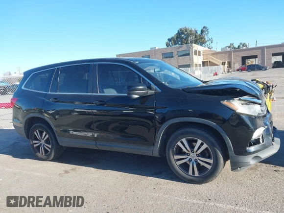 2018 Honda Pilot EX-L with VIN 5FNYF5H58JB013113, listed as a IAAI auction lot 41313206 with 125,825 mi miles. Bid and sale history available at carsss.com. Image 13.
