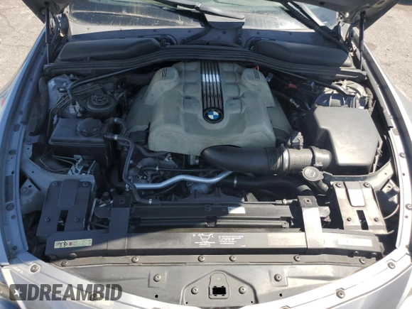 2004 BMW 6 Series 645Ci z VIN WBAEK73424B260298, wystawiony jako Copart lot #56266565 z przebiegiem 139 070 mil mil oraz Tytuł czysty. Historia ofert i sprzedaży dostępna na DreamBid. Obrazek 11.