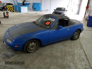 1990 Mazda MX-5 Miata z VIN JM1NA3519L0103105, wystawiony jako Copart lot #59009295 z przebiegiem Nie podano mil oraz Czysty tytuł • Clean title. Historia ofert i sprzedaży dostępna na DreamBid. Obrazek 1.