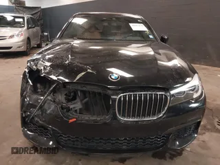 2018 BMW 7 Series 740i xDrive z VIN WBA7E4C51JGV24133, wystawiony jako IAAI lot #42253139 z przebiegiem 77 370 mil mil oraz . Historia ofert i sprzedaży dostępna na DreamBid. Obrazek 12.