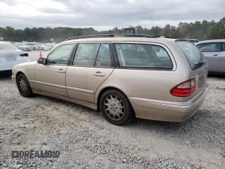 2001 Mercedes-Benz E-Class with VIN WDBJH65J41B312277, listed as a Copart auction lot 70261594 with 123,702 mi miles and Clean Title. Bid and sale history available at carsss.com. Image 2.