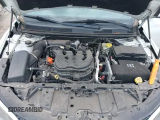 2015 Chrysler 200 C with VIN 1C3CCCCGXFN631935, listed as a IAAI auction lot 42144521 with 157,531 mi miles. Bid and sale history available at carsss.com. Image 10.