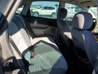 2007 Ford Focus S z VIN 1FAHP34N77W192231, wystawiony jako Copart lot #59020505 z przebiegiem 99 284 mil mil oraz Szkoda całkowita • Salvage title. Historia ofert i sprzedaży dostępna na DreamBid. Obrazek 10.