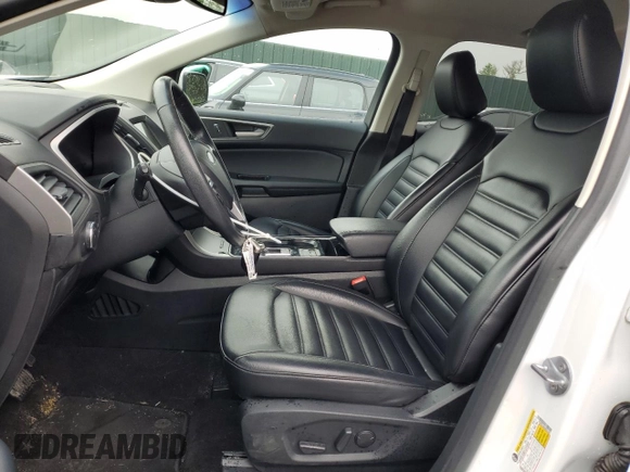 2020 Ford Edge SEL z VIN 2FMPK3J90LBB01559, wystawiony jako Copart lot #61365305 z przebiegiem 120 050 mil mil oraz Czysty tytuł • Clean title. Historia ofert i sprzedaży dostępna na DreamBid. Obrazek 7.