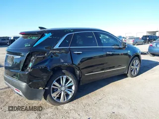 2024 Cadillac XT5 FWD Premium Luxury with VIN 1GYKNCRS4RZ729461, listed as a IAAI auction lot 41411300 with 5,760 mi miles. Bid and sale history available at carsss.com. Image 6.