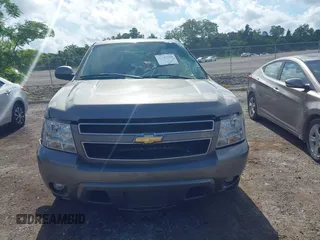 2007 Chevrolet Suburban LS with VIN 1GNFC16J77R260500, listed as a IAAI auction lot 42787990 with 167,163 mi miles and . Bid and sale history available at DreamBid. Image 13.