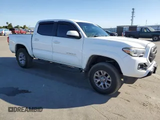 2017 Toyota Tacoma SR z VIN 5TFAX5GNXHX074690, wystawiony jako Copart lot #56672165 z przebiegiem 107 292 mil mil oraz Szkoda całkowita • Salvage title. Historia ofert i sprzedaży dostępna na DreamBid. Obrazek 4.