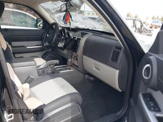 2007 Dodge Nitro SLT with VIN 1D8GU58K97W583862, listed as a IAAI auction lot 41378801 with 227,713 mi miles. Bid and sale history available at carsss.com. Image 5.