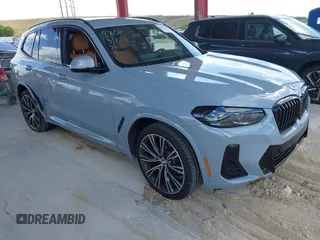 2024 BMW X3 sDrive30i z VIN WBX47DP00RN289541, wystawiony jako IAAI lot #41920481 z przebiegiem 7 859 mil mil oraz . Historia ofert i sprzedaży dostępna na DreamBid. Obrazek 1.