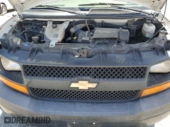 2013 Chevrolet Express Cargo z VIN 1GCZGTCA9D1165263, wystawiony jako Copart lot #51661055 z przebiegiem 172 369 mil mil oraz Szkoda całkowita • Salvage title. Historia ofert i sprzedaży dostępna na DreamBid. Obrazek 13.