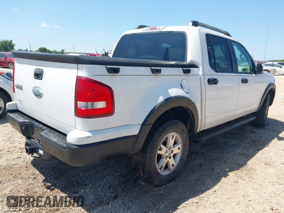 2007 Ford Explorer Sport Trac XLT z VIN 1FMEU31K17UA04200, wystawiony jako IAAI lot #42733514 z przebiegiem 180 899 mil mil oraz . Historia ofert i sprzedaży dostępna na DreamBid. Obrazek 4.