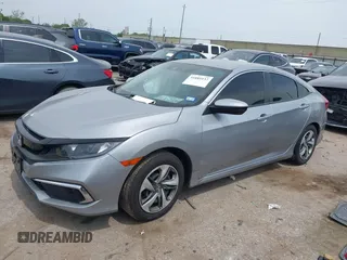 2019 Honda Civic LX with VIN 19XFC2F66KE026931, listed as a IAAI auction lot 41885137 with 55,057 mi miles and . Bid and sale history available at DreamBid. Image 17.