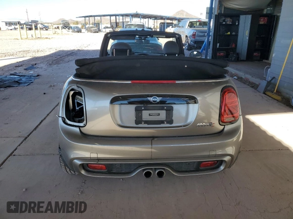 2019 MINI Convertible Cooper S с VIN WMWWG9C54K3E40225, выставлен на аукционе Copart как лот 42201665 с пробегом 56 749 миль миль и Списание • Salvage title. История ставок и продаж доступна на DreamBid. Изображение 6.