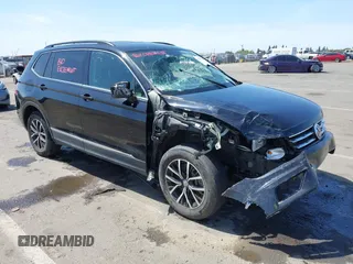 2021 Volkswagen Tiguan SE z VIN 3VV3B7AX1MM009970, wystawiony jako IAAI lot #42190045 z przebiegiem Nie podano mil oraz . Historia ofert i sprzedaży dostępna na DreamBid. Obrazek 1.