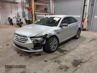 2013 Ford Taurus Limited with VIN 1FAHP2F83DG116657, listed as a IAAI auction lot 41533075 with 124,649 mi miles. Bid and sale history available at carsss.com. Image 21.