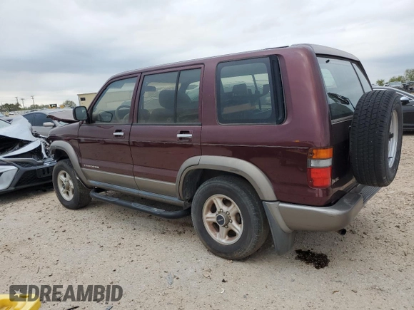 2000 Isuzu Trooper S with VIN JACDJ58X3Y7J09857, listed as a Copart auction lot 79924354 with Not provided miles and Clean title. Bid and sale history available at DreamBid. Image 2.