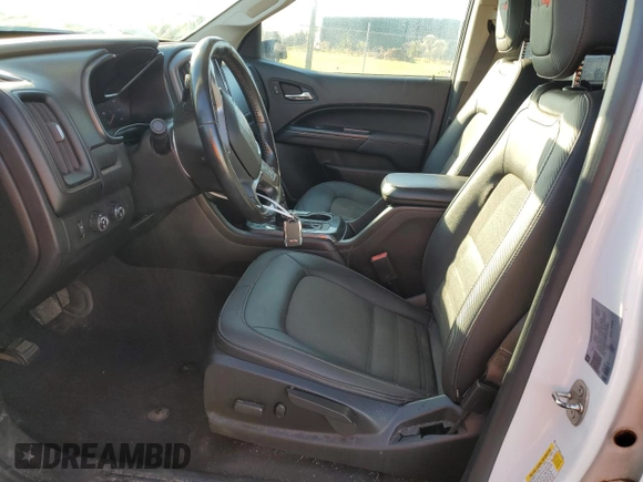 2021 GMC Canyon 4WD AT4 w/Cloth with VIN 1GTG6FEN9M1216062, listed as a Copart auction lot 80932634 with 73,308 mi miles and Salvage Title. Bid and sale history available at carsss.com. Image 7.