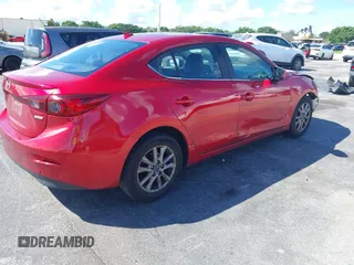 2016 Mazda 3 i Grand Touring with VIN JM1BM1X74G1282525, listed as a IAAI auction lot 40460438 with 216,301 mi miles and . Bid and sale history available at DreamBid. Image 4.