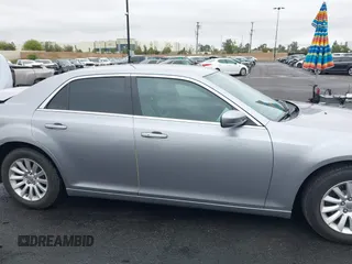 2014 Chrysler 300 with VIN 2C3CCAAG7EH249196, listed as a IAAI auction lot 42180023 with 48,241 mi miles and . Bid and sale history available at DreamBid. Image 14.