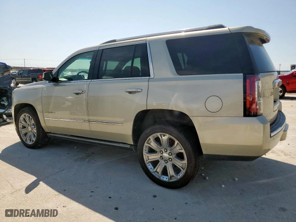 2015 GMC Yukon Denali with VIN 1GKS2CKJ9FR113741, listed as a Copart auction lot 50433165 with 158,212 mi miles and Salvage Title. Bid and sale history available at carsss.com. Image 2.