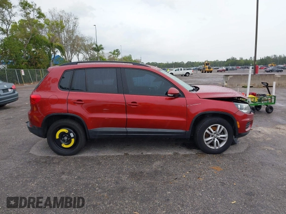 2015 Volkswagen Tiguan R-Line with VIN WVGAV7AXXFW106001, listed as a IAAI auction lot 41652896 with 131,031 mi miles and . Bid and sale history available at DreamBid. Image 14.