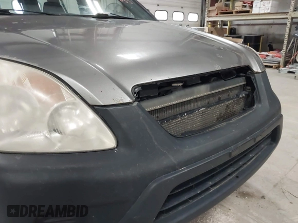 2006 Honda CR-V LX with VIN JHLRD785X6C053853, listed as a IAAI auction lot 42018895 with 246,316 mi miles and . Bid and sale history available at carsss.com. Image 6.