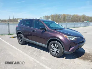 2016 Toyota RAV4 LE with VIN 2T3ZFREV4GW284902, listed as a IAAI auction lot 42054633 with 117,463 mi miles. Bid and sale history available at carsss.com. Image 1.