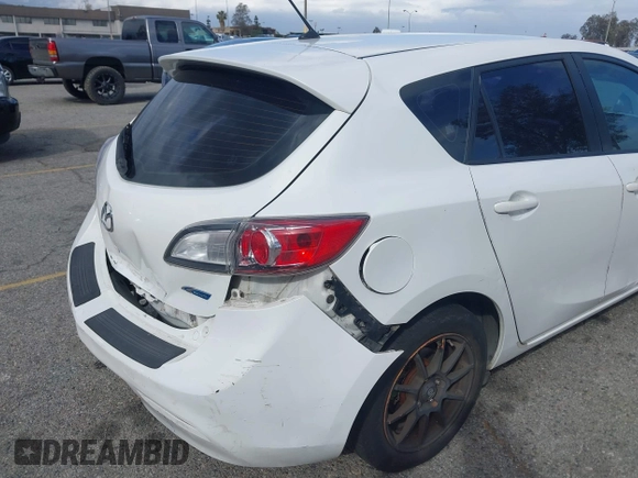 2012 Mazda Mazda3 i Touring with VIN JM1BL1L82C1695636, listed as a IAAI auction lot 41812909 with 199,314 mi miles. Bid and sale history available at carsss.com. Image 6.