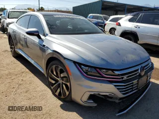 2019 Volkswagen Arteon SEL Premium R-Line z VIN WVWTR7AN8KE000839, wystawiony jako Copart lot #73440123 z przebiegiem 76 316 mil mil oraz . Historia ofert i sprzedaży dostępna na DreamBid. Obrazek 4.