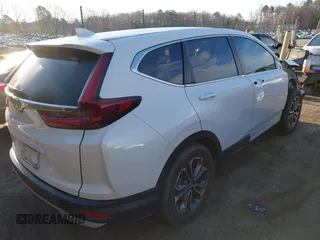 2021 Honda CR-V EX with VIN 2HKRW1H5XMH402791, listed as a IAAI auction lot 41815299 with 58,700 mi miles. Bid and sale history available at carsss.com. Image 4.