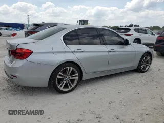 2018 BMW 3 Series 330i xDrive with VIN WBA8D9C50JEM33631, listed as a Copart auction lot 57595925 with 96,582 mi miles and Salvage title. Bid and sale history available at DreamBid. Image 3.