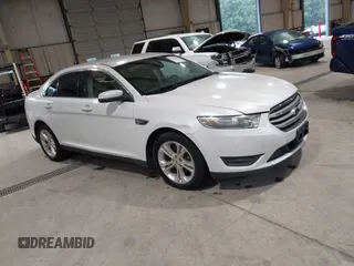 2013 Ford Taurus SEL z VIN 1FAHP2H83DG172272, wystawiony jako IAAI lot #42248609 z przebiegiem 193 428 mil mil oraz . Historia ofert i sprzedaży dostępna na DreamBid. Obrazek 1.