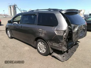 2014 Toyota Sienna XLE with VIN 5TDYK3DC2ES418860, listed as a IAAI auction lot 40139260 with 67,599 mi miles and . Bid and sale history available at DreamBid. Image 3.