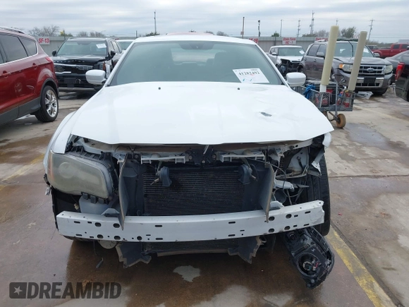 2013 Chrysler 300 with VIN 2C3CCABGXDH735739, listed as a IAAI auction lot 41282492 with 121,487 mi miles. Bid and sale history available at carsss.com. Image 13.